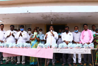 Distribution of essential commodities to poor families in Warangal