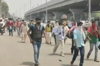 migrant labor gather in panipat bus stand