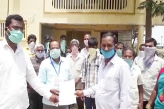 Workers protest in front of tahsildar's office at dubbaka siddipet