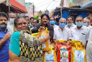 rice bags distribution in visakhapatnam to fishermen by mp mvv satyanarayana