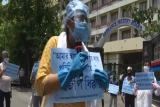 INTTUC members protest outside Ordnance Factory Board in Kolkata