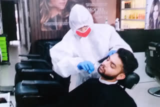 salon employees using PPE kit