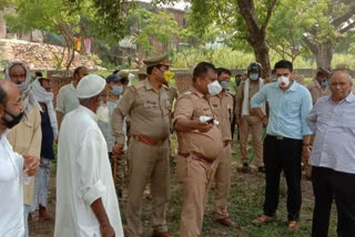 कब्र खोदने को लेकर विवाद