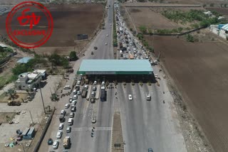 Long lines of vehicles at Bharudi Toll Plaza