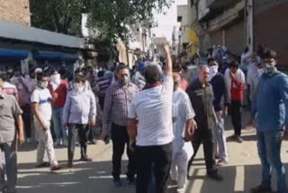 shopkeepers protest against city council officials in palwal