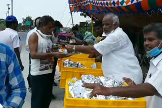 food packets distribution at singavaram