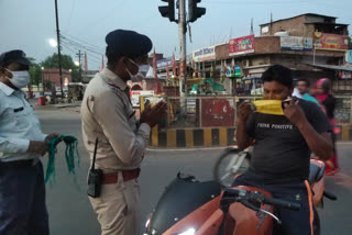 Police appealing people to apply masks with folded hands