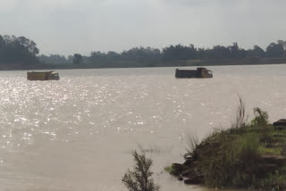 5 trucks stuck in river bed after sudden release of water from check dam