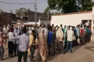 Crowd outside warehouse