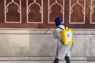 Youth of Sikh society sanitize Jama Masjid