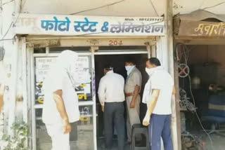 palwal district administration taking action against shopkeepers who violate odd even rule