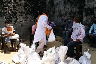 bjp leader gopal jha stop distributing food to needy people at burari