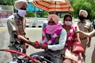 Punjab police garland newly-wed couple