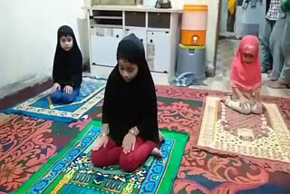 Children praying at home