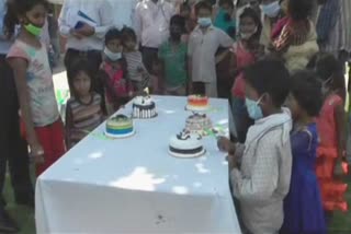 karnal district administration celebrate birthday of migrant children in radha swami satsang ghar