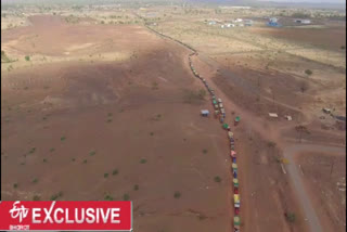 Farmers waiting for their turn with a long Queue