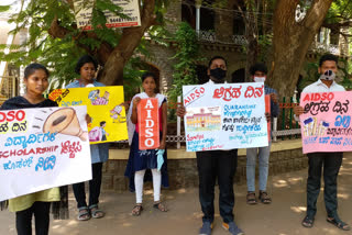 protest by AIDSO Organization at Bellary