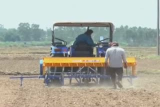 farmers sowing paddy with dsr machine in ambala