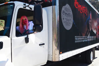 Lady Gaga drives large truck to deliver Chromatica to retailers