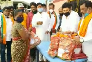 bjp leaders distributed groceries to needy and sanitation workers in secundrabad