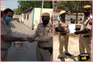 Homeopathy medicines and sanitizers distributed to police staff at Baba Haridas Nagar police station