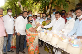 essentials distribution to poor by mla muta gopal at adikmet