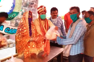 essentials distributed on his marriage occasion by yuva care welfare society president in giddaluru