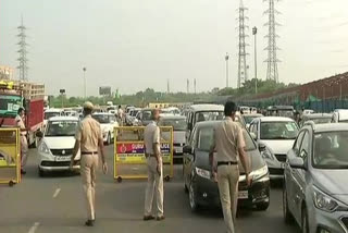 Heavy traffic movement at Delhi-Gurugram border; Police check passes, IDs of commuters