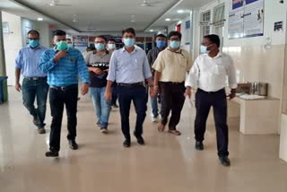 Collector inspecting hospital