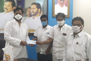 tuni talapulamma lova temple employees donation to cm relief fund