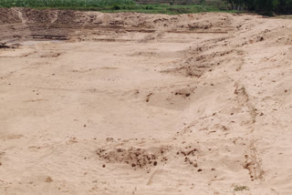 pond being constructed along the river