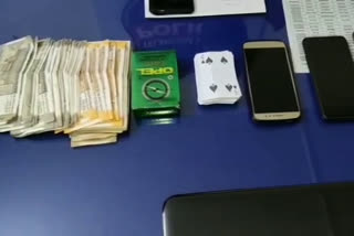 five persons who are played with cards were arrested by the police in nagarkarnool