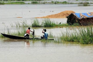 Assam flood Assam news Flood in Assam Assam State Disaster Management ഗുവാഹത്തി അസം അസം സ്റ്റേറ്റ് ഡിസാസ്റ്റർ മാനേജ്‌മെന്‍റ് അതോറിറ്റി വെള്ളപ്പൊക്കം അസം വെള്ളപ്പൊക്കം