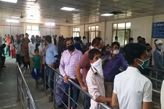 crowd at old faridabad railway ticket counter