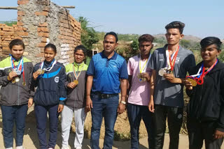 International archer Jainti Lal Nanoma with her athletes