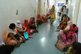 women in line for checkup