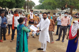 villagers giving memorandum to tehsildar