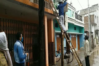 Employees fixing power failure in the area