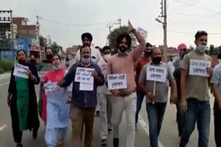 protest outside vijay inder singla's residence in sangrur