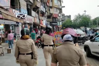 Women police patrolling team is making people aware in delhi market areas