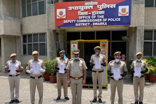 Dwarka North police station Six policemen honored with cash prizes