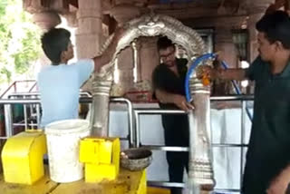 The cleaning staff of the Alampur temple