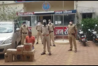 Police arrested an accused while transporting illegal liquor
