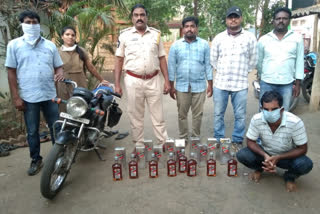 Arrest of three persons for  illegally  alcohol moving  to Telangana  in jangareddygudem