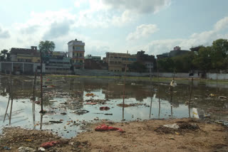 vegetable sellers are set up shop in vegetable market due to water logging in padav maidan