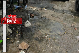 sewer water flowing on road