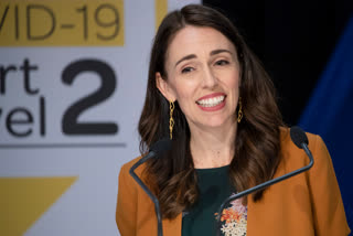 As New Zealand eradicates virus, PM Ardern dances