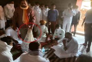 Locust attack in Jodhpur, farmer carry a box full of locust