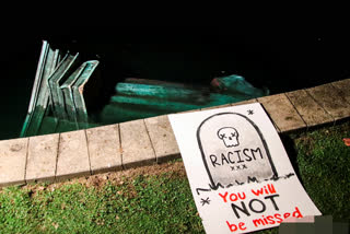 A statue of Christopher Columbus in Virginia was torn down by protesters on Tuesday.