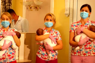 Parents meet surrogate babies stranded in Ukraine